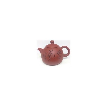 Teiera in terracotta con disegni neri
