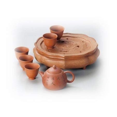 Teiera in terracotta con disegni neri