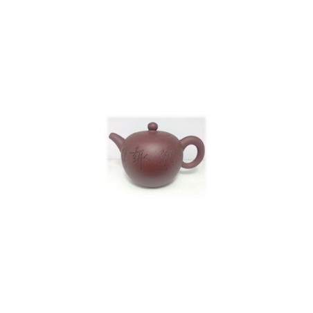 Teiera in terracotta con disegni neri